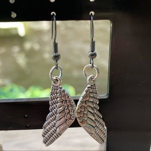Silver Feather And wing shaped earrings